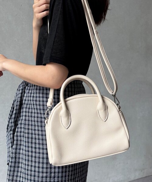 CPCM(シーピーシーエム)の「フロントポケットボストンバッグ(ボストンバッグ・レディース・アイボリー/ブラック/ブラウン/キャメル・FREE)」の1枚目の写真