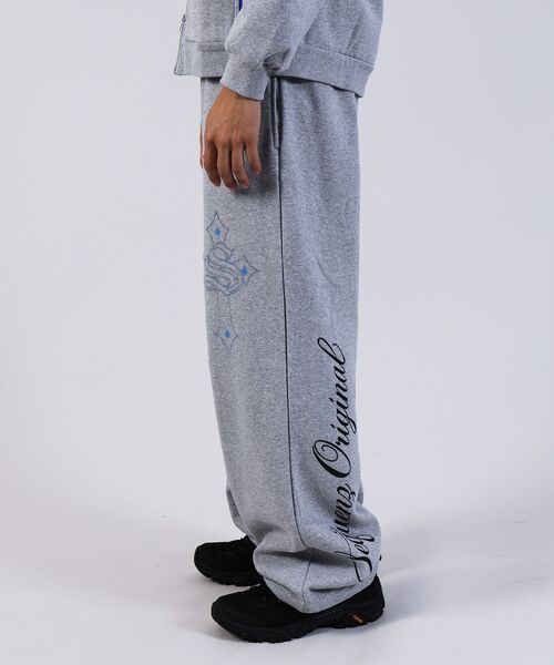 SEQUENZ（シークエンズ）】CROSS RHINE STONE SWEAT PANTS / ライン