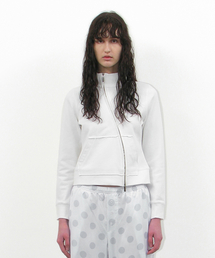 PARTIMENTO WOMEN（パルティメントウィメン）の「カットオフ93アシンメトリートラックジップアップ_オフホワイト（ナイロンジャケット）」