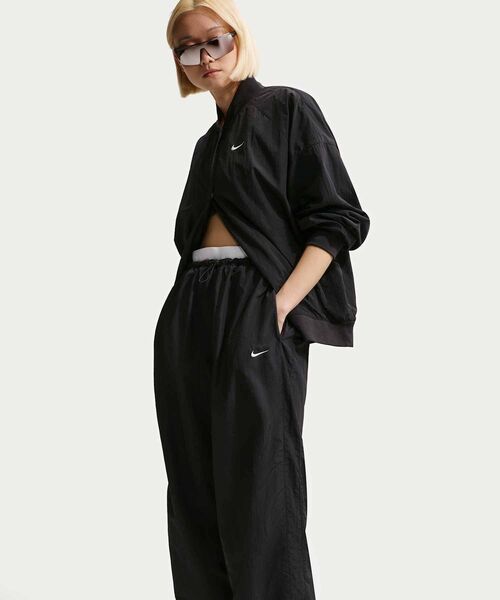 NIKE(ナイキ)の「ナイキ スポーツウェア ウィメンズ ルーズ ハイウエスト パラシュート パンツ / Nike Sportswear Women's Loose High-Waisted Parachute Pants IF0335-010 Black(その他パンツ・レディース・ブラック・M/L/XS/XL/S)」の10枚目の写真
