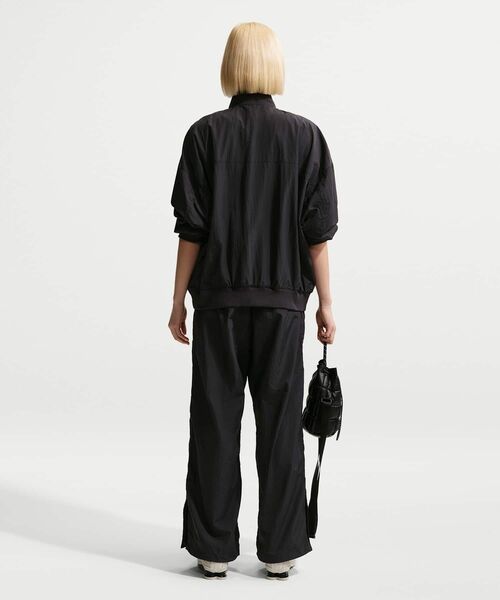 NIKE(ナイキ)の「ナイキ スポーツウェア ウィメンズ ルーズ ハイウエスト パラシュート パンツ / Nike Sportswear Women's Loose High-Waisted Parachute Pants IF0335-010 Black(その他パンツ・レディース・ブラック・M/L/XS/XL/S)」の11枚目の写真