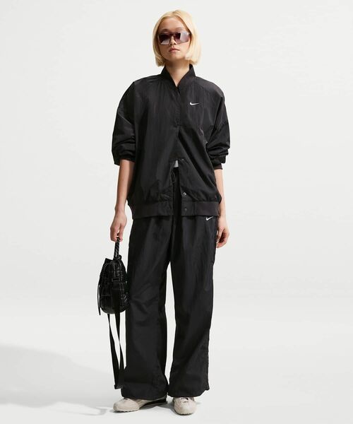 NIKE(ナイキ)の「ナイキ スポーツウェア ウィメンズ ルーズ ハイウエスト パラシュート パンツ / Nike Sportswear Women's Loose High-Waisted Parachute Pants IF0335-010 Black(その他パンツ・レディース・ブラック・M/L/XS/XL/S)」の7枚目の写真