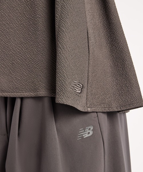 NEW BALANCE(ニューバランス)の「NB GREY フレアスリーブレストップ(Tシャツ/カットソー・レディース・オフホワイト/チャコールグレー・X-SMALL/SMALL/X-LARGE/LARGE/MEDIUM)」の9枚目の写真