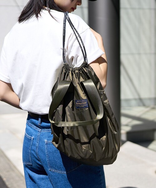 PUBLUX(パブリュクス)の「PENDLETON × PUBLUX/ペンドルトン 別注 2WAY リップストップ ナップザック 限定展開(バックパック/リュック・レディース・オリーブ/グレー/ブラック・ONE SIZE)」の5枚目の写真