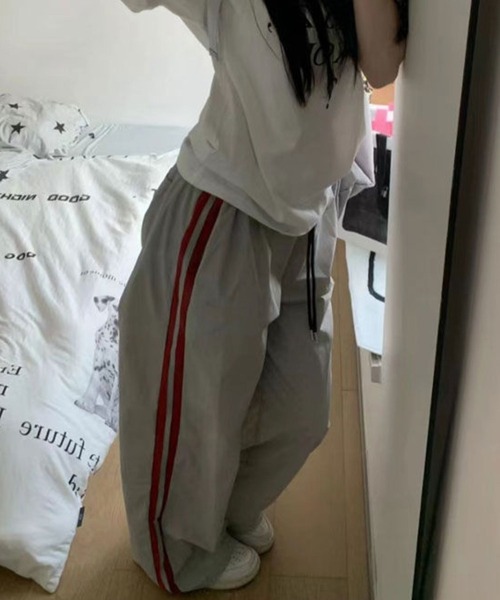 almo(アルモ)の「PT サイドラインナイロンパンツ(se)(その他パンツ・レディース・グレー/イエロー・FREE)」の1枚目の写真