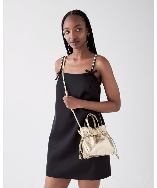 kate spade new york（ケイトスペード ニューヨーク）の「リオ メタリック ミニ トート バッグ（ショルダーバッグ・レディース・イエロー・ONESIZE）」の7枚目の写真
