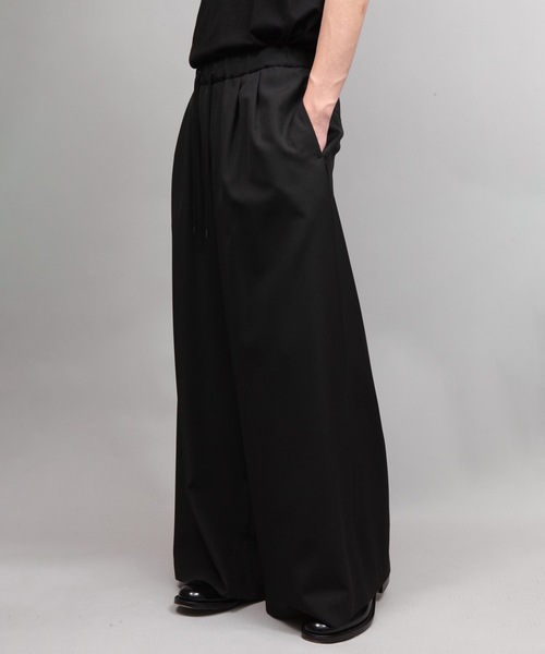 ato（アトウ）の「ULTRA WOOL WIDE PANTS（その他パンツ・メンズ・アイボリー/ブラック・44/46/48）」の3枚目の写真