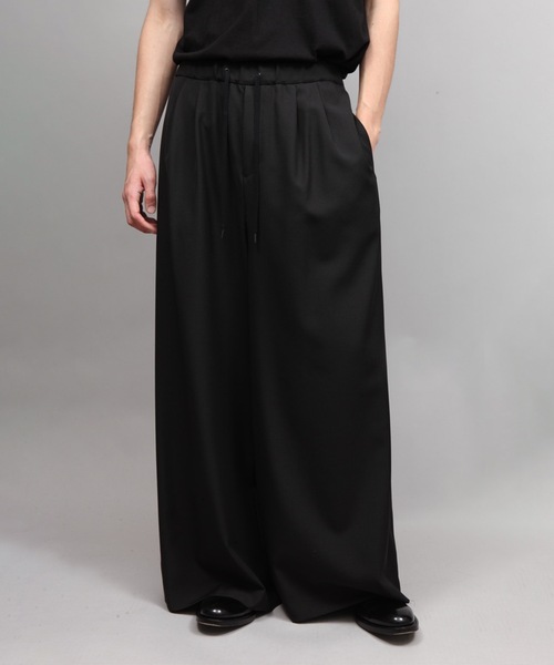 ato（アトウ）の「ULTRA WOOL WIDE PANTS（その他パンツ・メンズ・アイボリー/ブラック・44/46/48）」の4枚目の写真