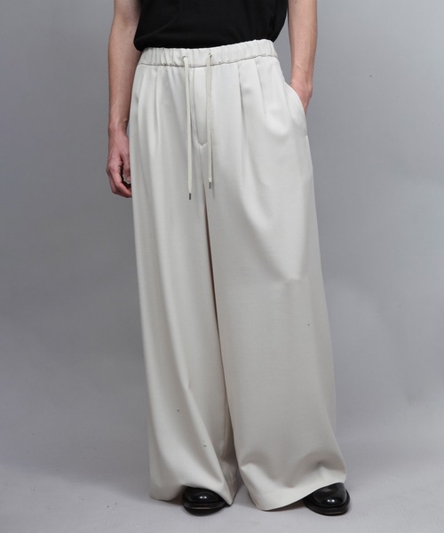 ato（アトウ）の「ULTRA WOOL WIDE PANTS（その他パンツ・メンズ・アイボリー/ブラック・44/46/48）」の5枚目の写真