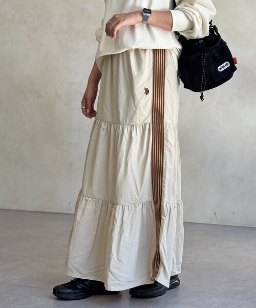 U.S. POLO ASSN.（ユーエスポロアッスン）の「ティアードスカート（スカート・レディース・アイボリー/ブラック/ネイビー/ブラウン系その他/グレー系その他/ブルー系その他/ブラック系その他/ベージュ系その他/ダークブルー/ベージュ系その他2/ブルー系その他2/ブラック系その他2/サックスブルー・FREE/PS）」の2枚目の写真