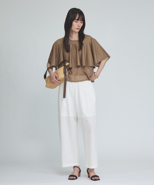 qualite(カリテ)の「【新色を加えてアップデート】シャイニーフレアニット 夏服 オフィスカジュアル きれいめ フリル(ニット/セーター・レディース・ダークベージュ/ネイビー/オフホワイト・フリー)」の20枚目の写真