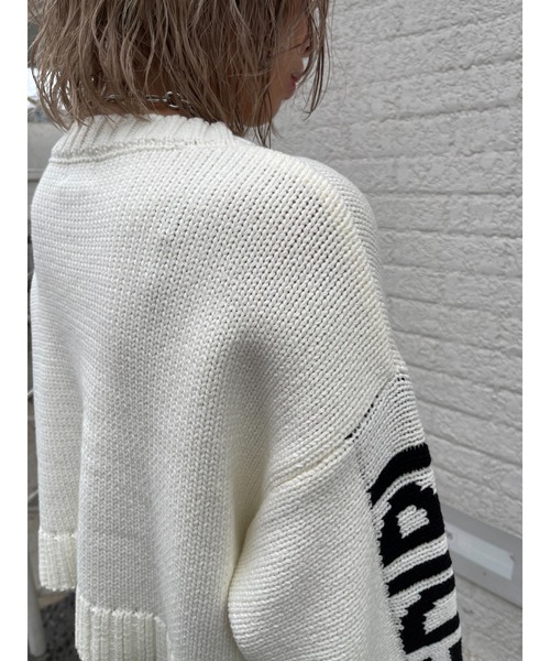 EGOIST(エゴイスト)の「スリーブメッセージニットトップス(ニット/セーター・レディース・ホワイト/ブラック/オレンジ・FREE)」の19枚目の写真