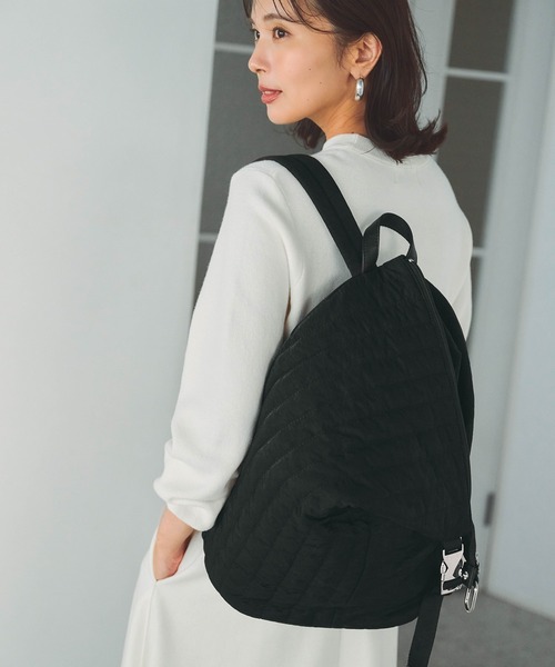 TREASURE TOPKAPI(トレジャートプカピ)の「【TREASURE TOPKAPI】ナイロン キルティング アシンメトリー リュック(バックパック/リュック・レディース・ブラック/グレー・FREE)」の2枚目の写真