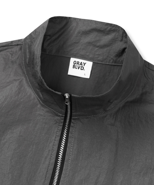 GRAYBLVD（グレイブラバット）の「メロウグロッシーウィンドブレーカージャケット (グレー)（ナイロンジャケット・レディース・その他・MEDIUM/LARGE）」の5枚目の写真