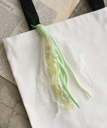 styiro（スタイロ）の「レース・リボンMIXヤーンタッセルチャーム（チャーム）」