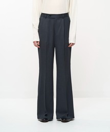 Juha（ユハ）の「FLUID FLARE PANTS（スラックス）」