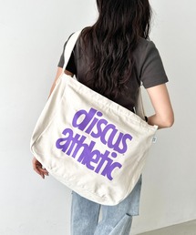 DISCUS（ディスカス）の「DISCUS/ディスカス キャンバスライク BIGショルダー/ロゴプリント/容量 約25リットル（ショルダーバッグ・メンズ）」