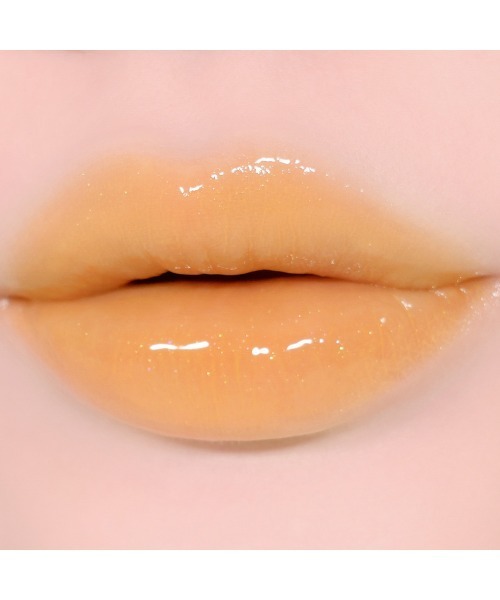 Milk Touch(ミルクタッチ)の「<新発売 / 全8色>ラブポーションシャイングロス(口紅/リップティント/グロス・レディース・01 Mellow Wink/00 Honey Magic/03 Peach Flirting/04 Apple Kiss/02 Pink Me/05 Love Catcher/06 Mauvely/07 Plum Potion・FREE)」の11枚目の写真
