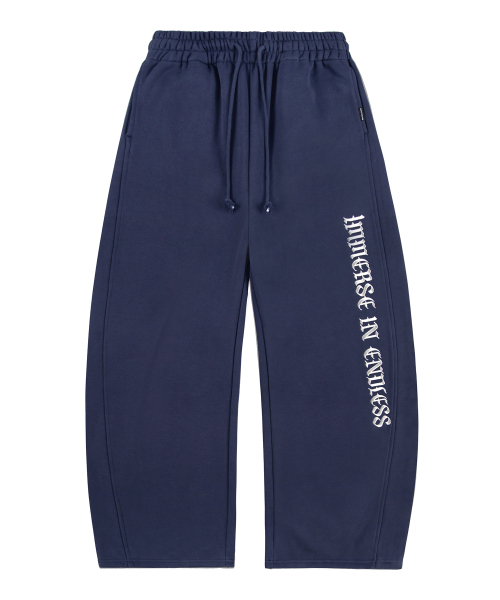 ROCKCAKE（ロックケーキ）の「Lettering Wide Curved Jogger - Navy（スウェットパンツ・レディース・その他・S/XS）」の2枚目の写真