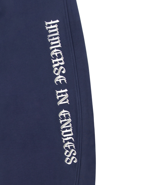 ROCKCAKE（ロックケーキ）の「Lettering Wide Curved Jogger - Navy（スウェットパンツ・レディース・その他・S/XS）」の4枚目の写真