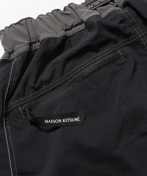 MAISON KITSUNE × and wanderナイロンパンツ Maison Kitsune（メゾンキツネ）の「Maison Kitsune/メゾン キツネ×and