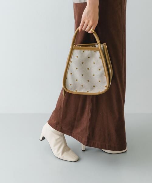 RODE SKO（ロデスコ）の「『WEB限定』ヒールブーツ（ブーツ・レディース・アイボリー/ブラック・37/36/38）」の19枚目の写真