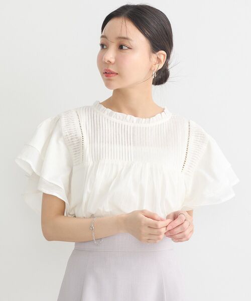 earth music&ecology(アースミュージックアンドエコロジー)の「フリルピンタック半袖ブラウス(シャツ/ブラウス・レディース・ブラック/オフホワイト/ブルー/レッド・FREE)」の1枚目の写真