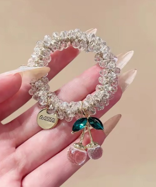 TONE SELECT GOODS（トーンセレクトグッズ）の「【urge select】さくらんぼモチーフ ビーズ ヘアゴム（ヘアゴム・レディース・クリア/カラフル・FREE）」の2枚目の写真