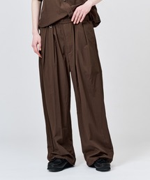 WETTEMPT（ウィテンプト）の「NYLON BICOLOR 2TUCK DRAWSTRING PANTS / ナイロンバイカラーツータックドローコードパンツ（その他パンツ）」