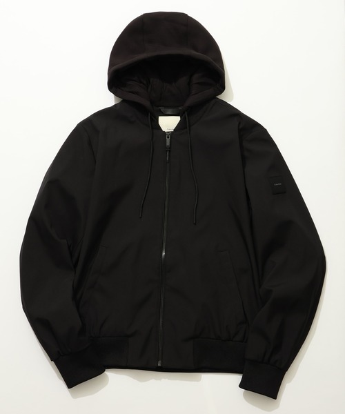 Calvin Klein(カルバン・クライン)の「【Calvin Klein/カルバンクライン】CANNON SOFT SHELL BPMBER RE/フーデッド ジップアップ パデッドブルゾン(ブルゾン・メンズ・ブラック/グレー系/オリーブ/ネイビー系・L/S/M/XL)」の2枚目の写真