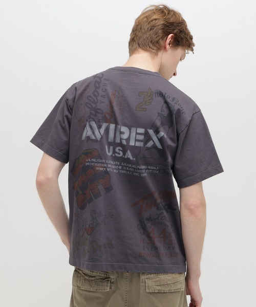 AVIREX(アヴィレックス)の「ARCHIVE PRINT T-SHIRT / アーカイブ プリント Tシャツ / AVIREX /アヴィレックス(Tシャツ/カットソー・メンズ・ナチュラル/チャコール・LARGE/MEDIUM/XX-LARGE/X-LARGE)」の6枚目の写真