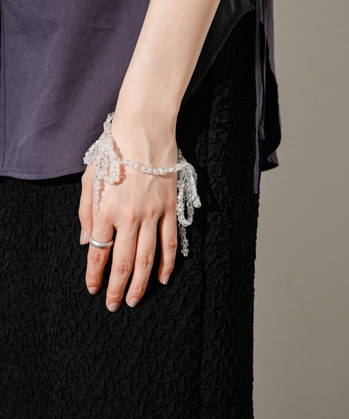 KBF（ケイビーエフ）の「リボンビーズブレスレット（ブレスレット・レディース・オレンジ/クリア・ONE）」の2枚目の写真