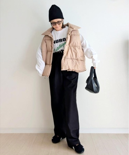Belle Cie（ベルシー）の「裾コード付きボリュームあったかスタンドハイネック中綿ベスト（ベスト・レディース・ホワイト/ベージュ/ブラック・L/XL/XXL/M）」の12枚目の写真