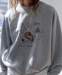 leune（ルネ）の「ケーキ刺繍ラグランスウェット/裏起毛トップス（スウェット）」
