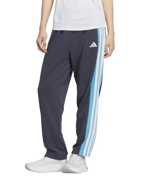 adidas(アディダス)の「アディダス adidas チームス ルーズフィット トラックパンツ(その他パンツ・レディース・ブラック/ネイビー・S/M/L/XL)」の1枚目の写真