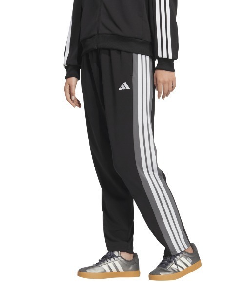 adidas(アディダス)の「アディダス adidas チームス ルーズフィット トラックパンツ(その他パンツ・レディース・ブラック/ネイビー・S/M/L/XL)」の2枚目の写真