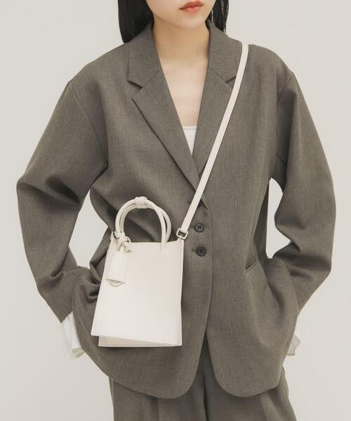 KBF（ケイビーエフ）の「チャーム付きスクエアミニBAG（ハンドバッグ・レディース・ブラック/オフホワイト・ONE）」の4枚目の写真