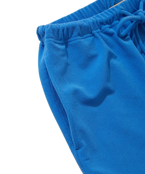 GUACAMOLE（ガカモレ）の「FUNCTIONAL PILE SHORT PANTS（ラッシュガード・レディース・ホワイト/オレンジ/ブルー・FREE）」の4枚目の写真