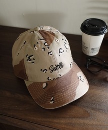 Sunny Smith（サニースミス）の「SUNNY SMITH OGロゴ刺繍Cap（ピグメント・カモフラ）（キャップ）」