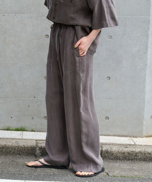 OUTDOOR PRODUCTS(アウトドアプロダクツ)の「追加 キュプラステッチワークドロストパンツ(スラックス・レディース・ネイビー/チャコールグレー・36/38)」の1枚目の写真