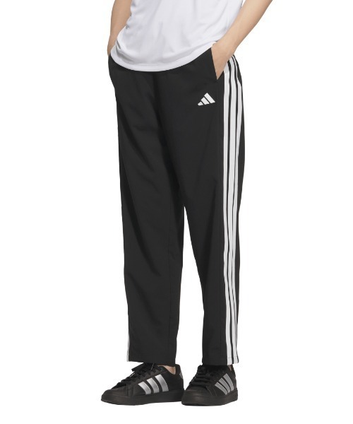adidas(アディダス)の「アディダス adidas チームス ルーズフィット クロス パンツ(その他パンツ・レディース・ネイビー/ブラック・S/M/L/XL)」の2枚目の写真