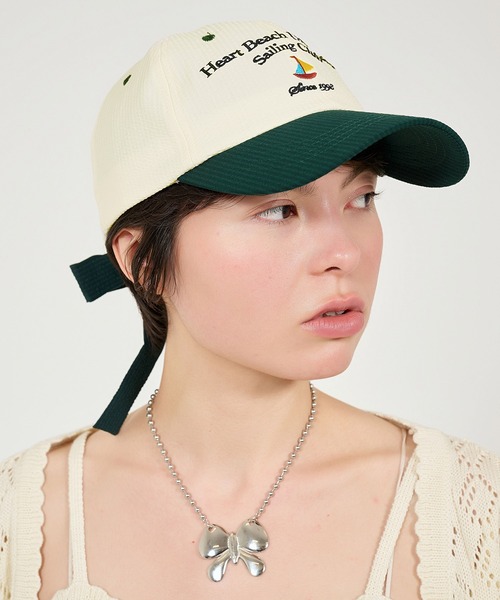 TINA:JOJUN(ティーナジョジュン)の「バイカラー リボンキャップ TINA:JOJUN(キャップ・レディース・ネイビー/ダークグリーン・F)」の14枚目の写真