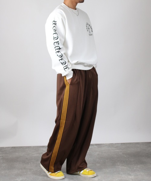 NYLAUS(ナイラス)の「【Nylaus】蜂刺繍 ライントラック ワイドパンツ バルーンパンツ ジャージ ユニセックス(その他パンツ・メンズ・アイボリー/ブラック/ブラウン・M/L)」の5枚目の写真