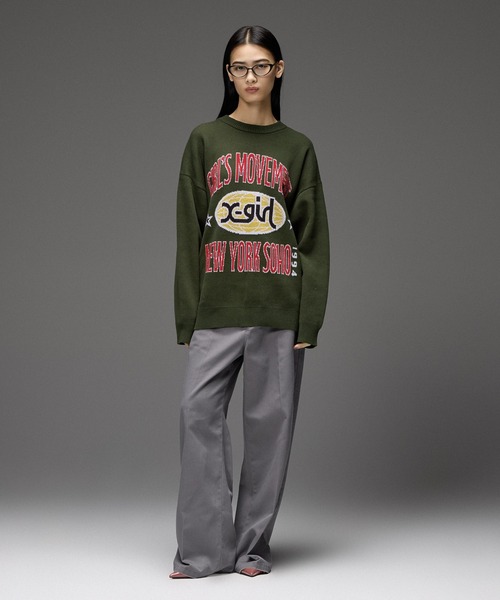 X-girl(エックスガール)の「WORLD LOGO JACQUARD KNIT TOP(ニット/セーター・レディース・アッシュ/ブラック/オリーブ・ONE SIZE)」の7枚目の写真