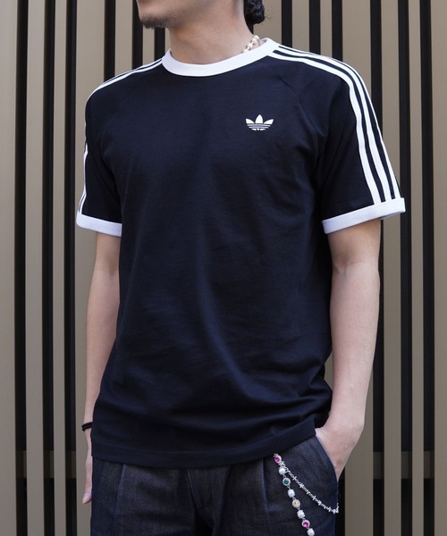 adidas(アディダス)の「adidas Originals(アディダスオリジナルス) 3-STRIPES TEE スリーストライプ Tシャツ ユニセックス【2026年春夏入荷モデル】(Tシャツ/カットソー・レディース・ブラック/ホワイト・L/M/S)」の1枚目の写真