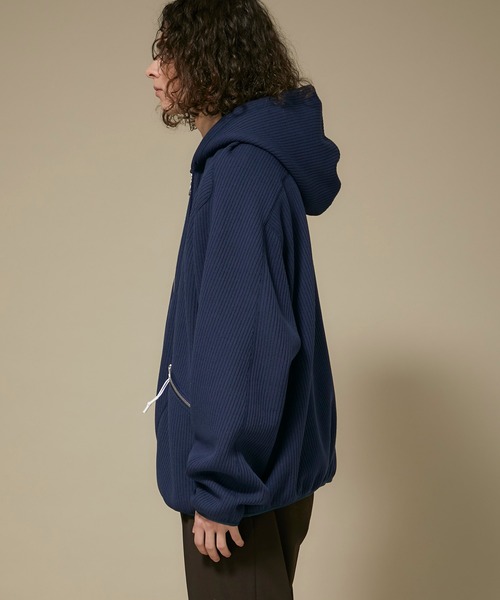 Name.（ネーム）の「【Name.】クオータ-ニットハーフジップパーカー / NMCU-19AW-013（パーカー・メンズ・ネイビー/ブラウン・1/2）」の9枚目の写真