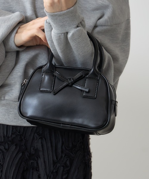 &. NOSTALGIA(アンドドットノスタルジア)の「【ZOZO限定】リボンハンドバッグ(ハンドバッグ・レディース・ホワイト/ブラック・FREE)」の2枚目の写真