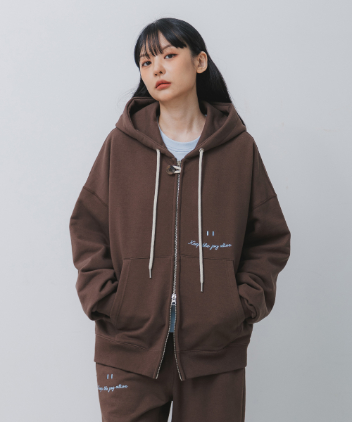 BAKKEN（バッケン）の「スマイル刺繍ロゴ2WAYボタンフードジップアップBK7985_ブラウン（パーカー・メンズ・ブラウン・FREE）」の3枚目の写真