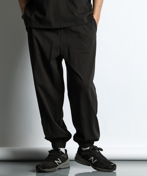The DUFFER of ST.GEORGE（ザダファーオブセントジョージ）の「8oz HEAVY WEIGHT COTTON 'GYM' EASY PANTS：セットアップ対応 ヘビーウェイト ジムパンツ / イージーパンツ / 8オンス / ルーズシルエット（スウェットパンツ・メンズ・ネイビー/ブルーグレー/ブラウン/スミクロ・MEDIUM/X-LARGE/LARGE）」の5枚目の写真