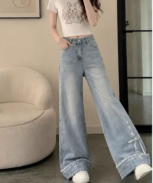 LUCPY(ラクピー)の「リボンデザインワイドデニムパンツ(デニムパンツ・レディース・ブルー・SMALL/X-LARGE/LARGE/MEDIUM)」の3枚目の写真
